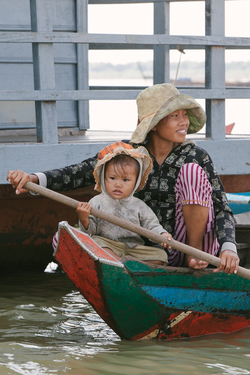 Woman and Child Boat Cambodia