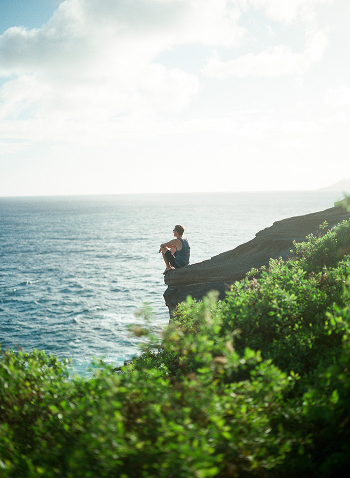 Man Resting on Cliffs of Oahu
