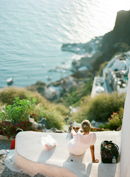 Woman Watching the Sunset in Oia