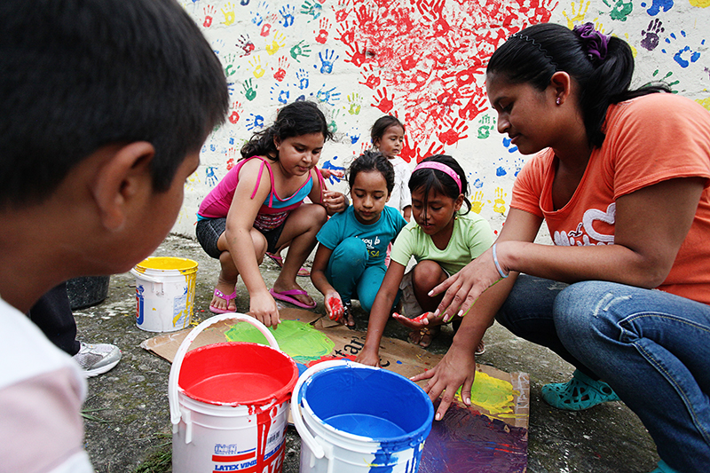 Children Painting at the Hombro A Hombro Medico Centro in Santo Domingo Ecuador