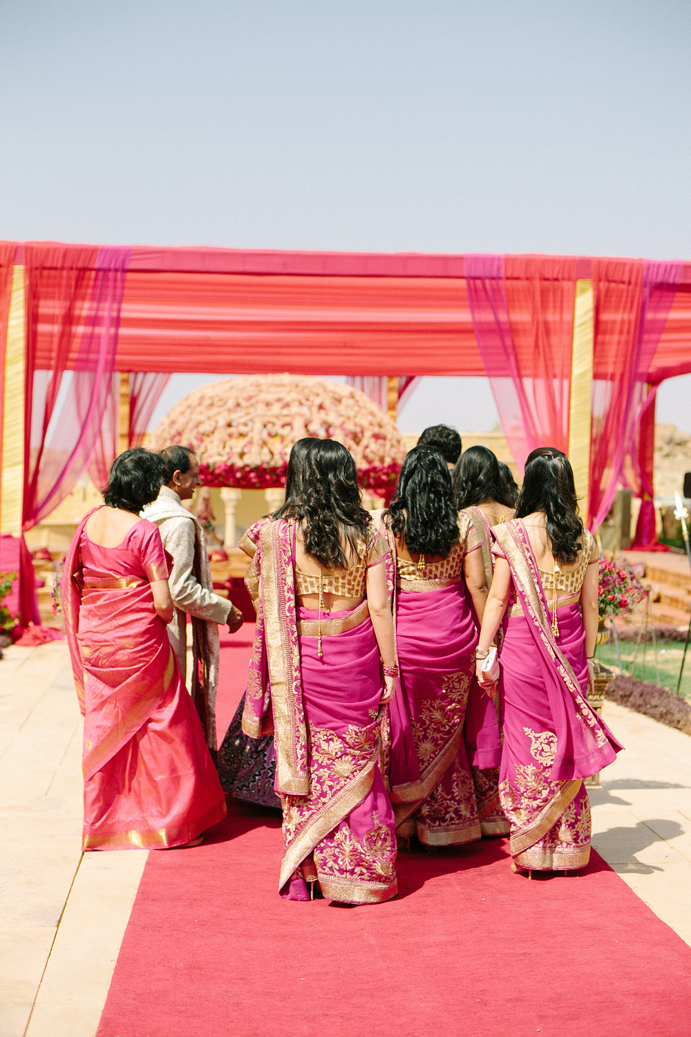 Girls Walk to Pheras Ceremony at Suryagarh Palace in India