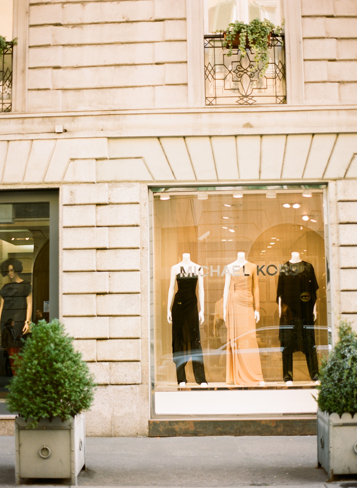 Fashion district in Milan with high-end stores and stylish pedestrians