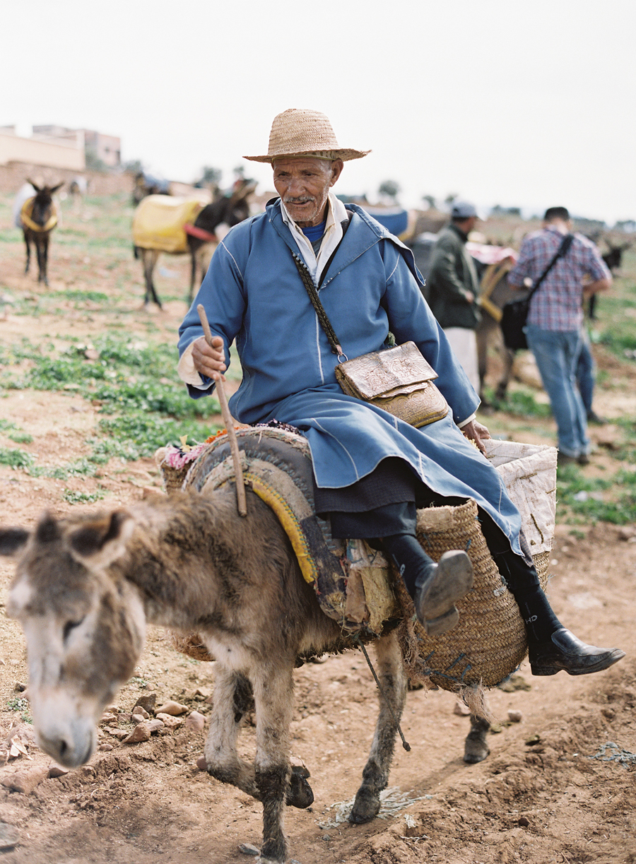 Man Riding Donkey in Morocco