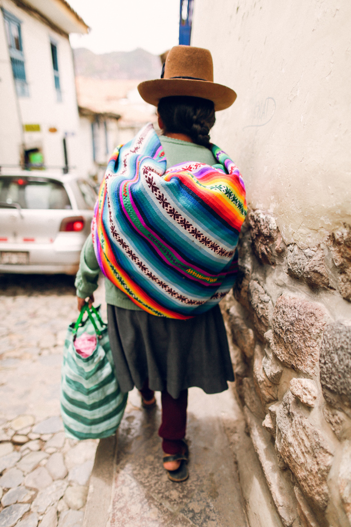 Woman Carrying Groceries in Peru