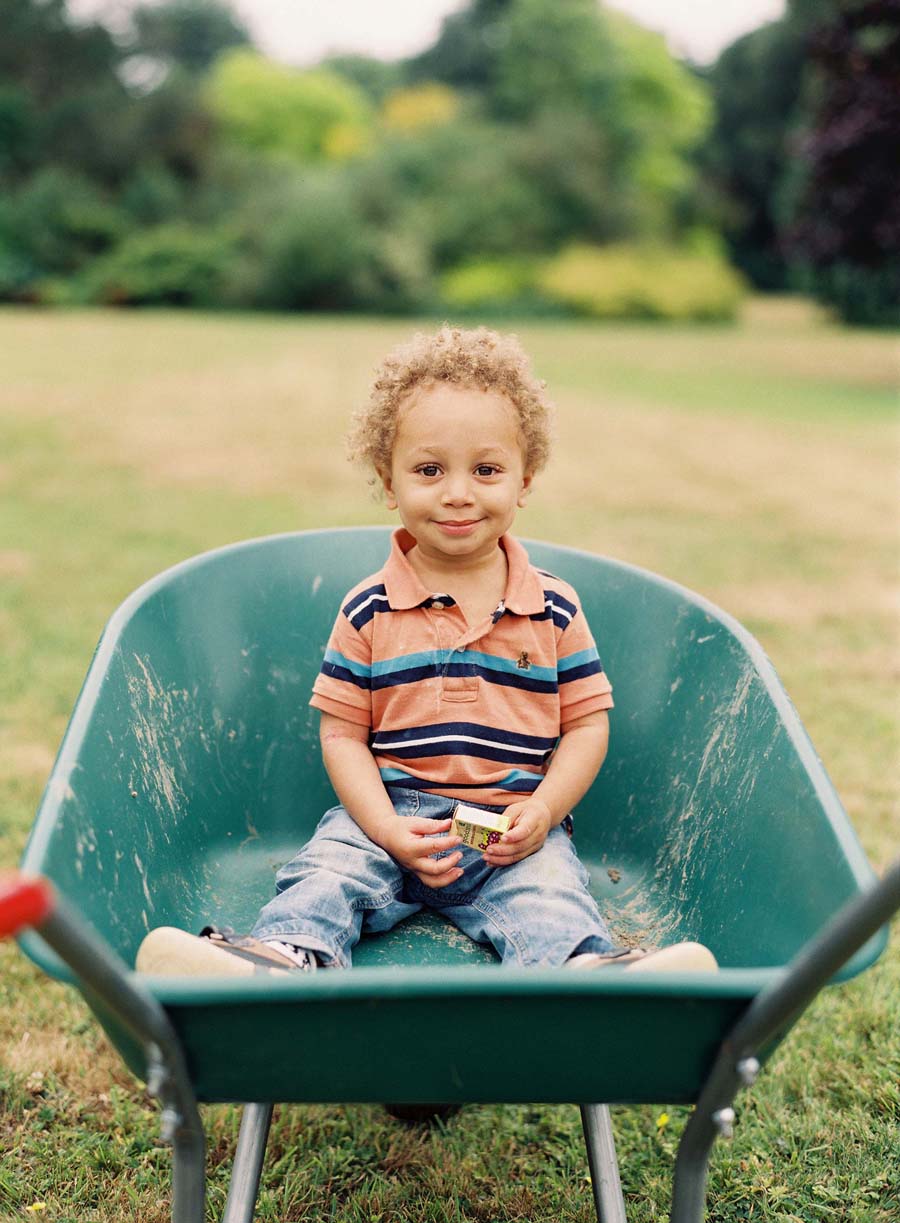 Young Boy in Wheelbarrow in Norfolk England