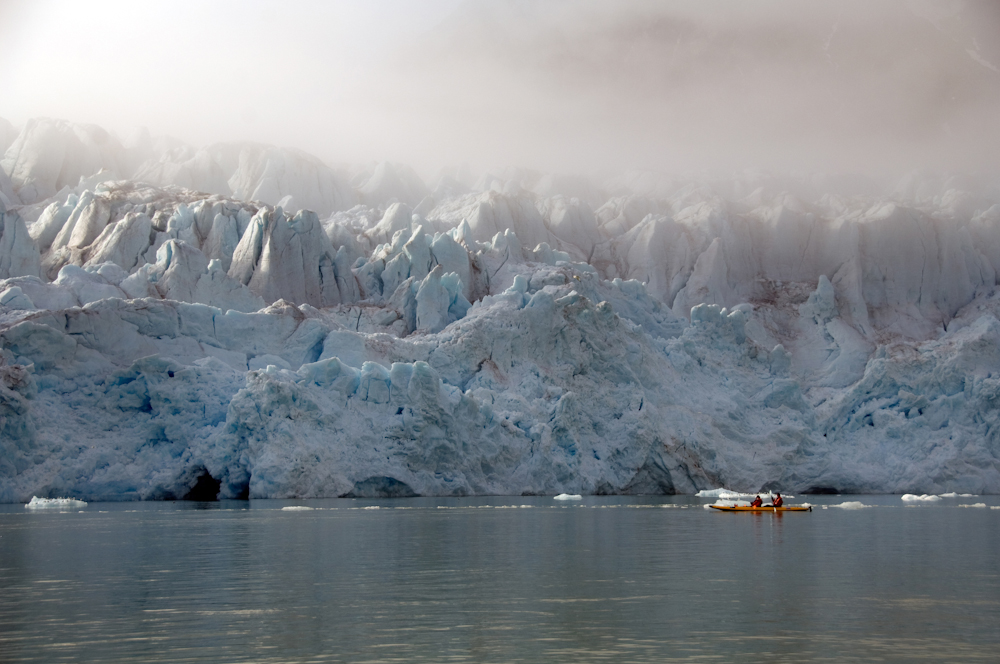 Canoeing Beside Icebergs in the Arctic