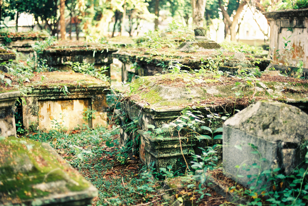 Moss Covered Gravestones at the Old Protestant Cemetery of Penang Malaysia