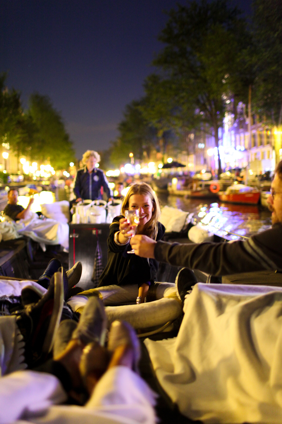 Toasting at the Canal in Amsterdam
