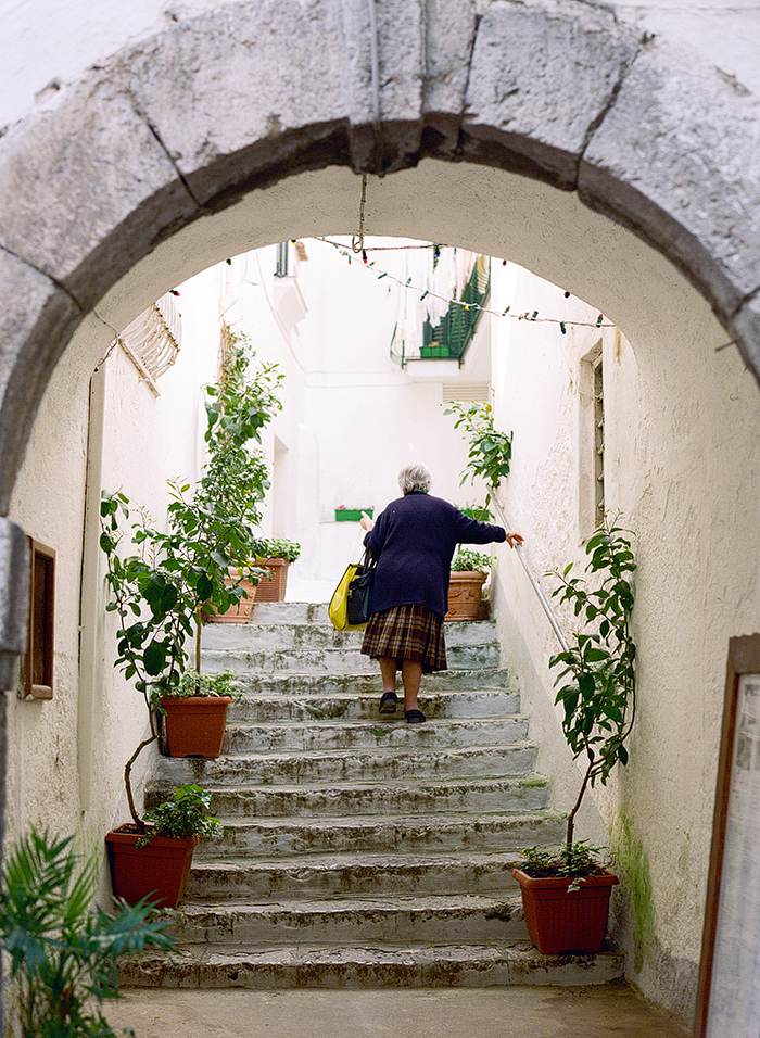 Woman Climbing Stairs on the Amalfi Coast