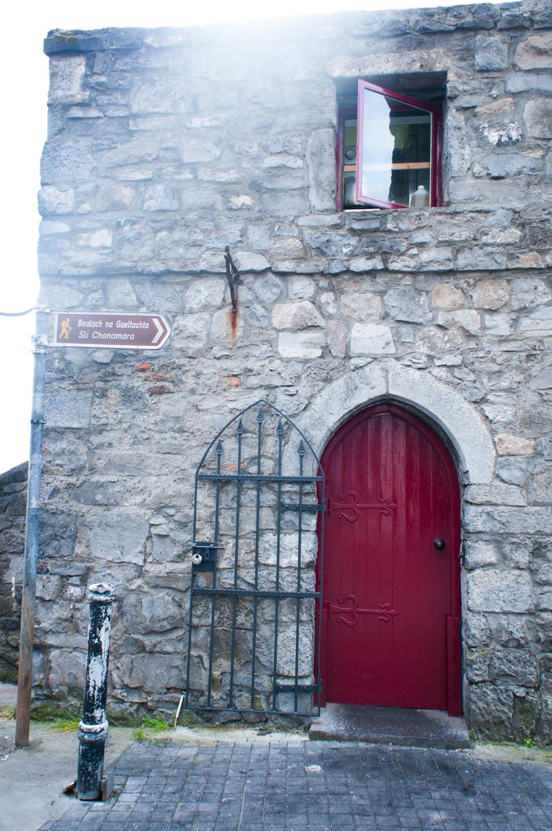 Red Door and Stone Building in Connemara Ireland
