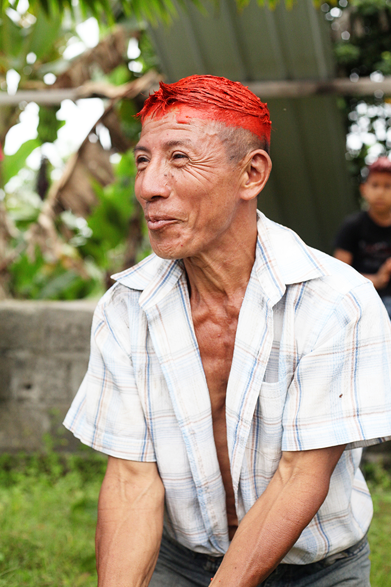 Man with Achiote Paint in Tsachilas Ecuador