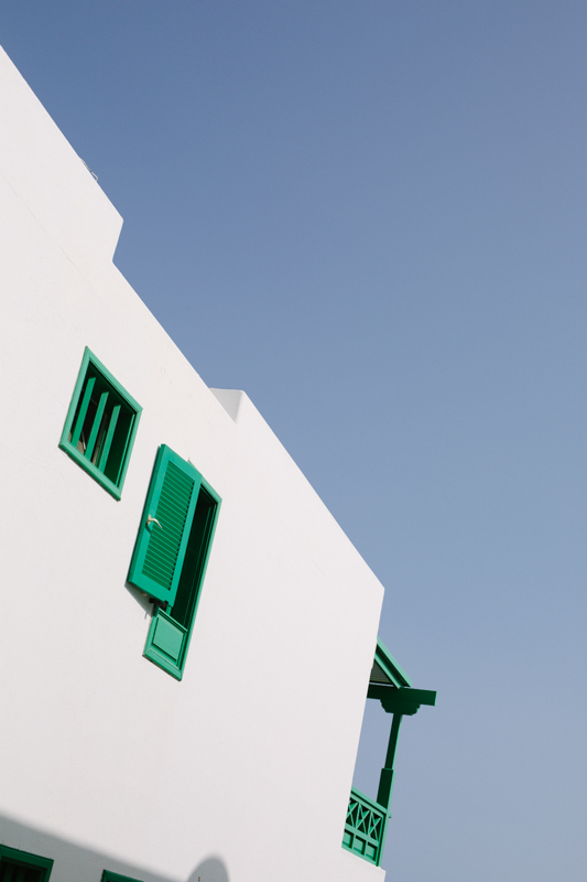 Green Shutters and Blue Sky in Lanzarote Spain