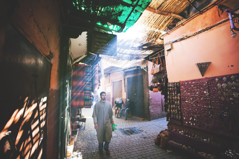 Man Walking the Marrakech Medina Market