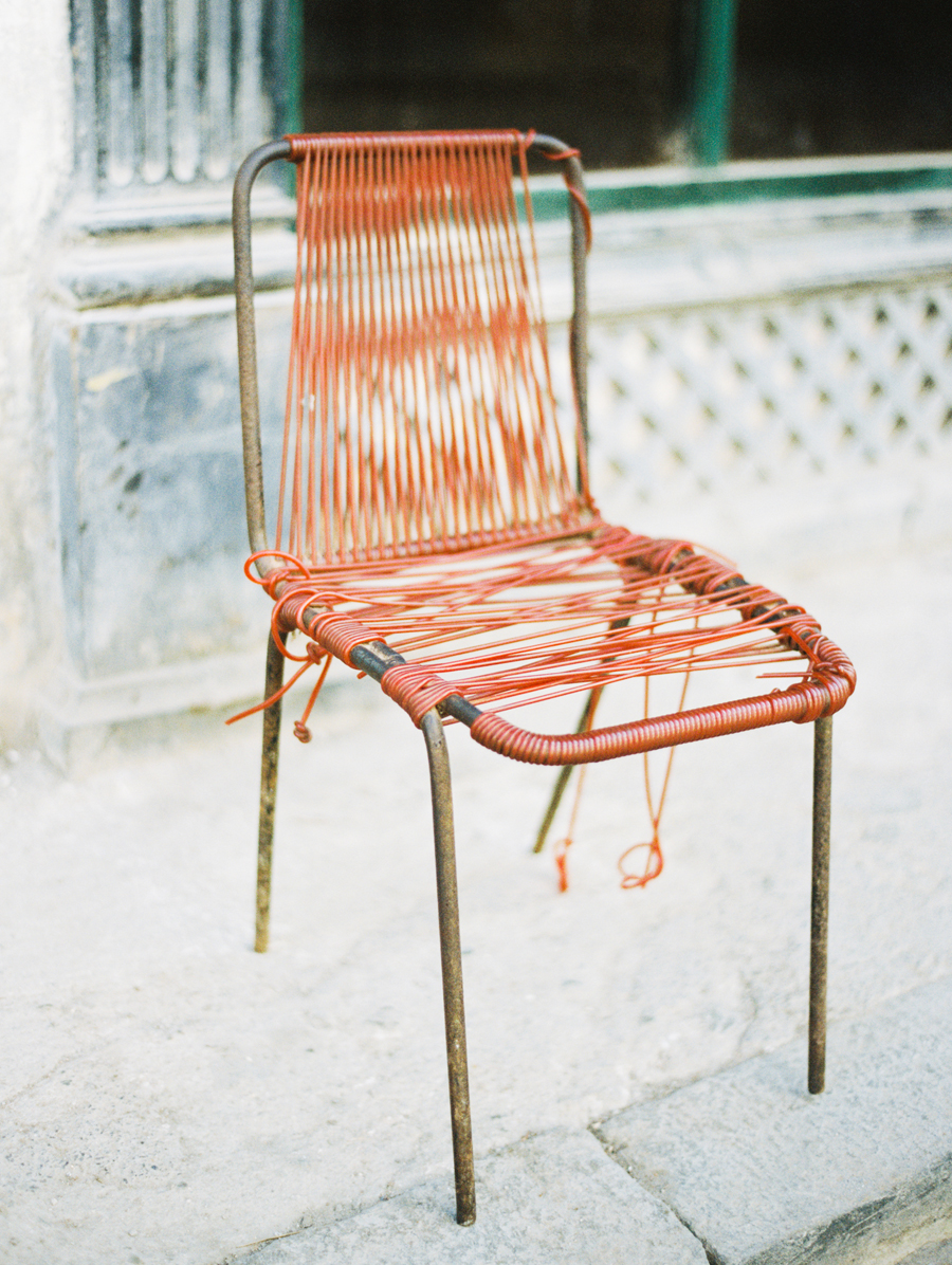 Aged Red Chair in Cuba Aged Red Chair in Cuba