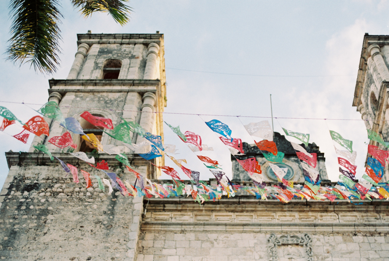 Church and Colorful Flags in Playa del Carmen Mexico