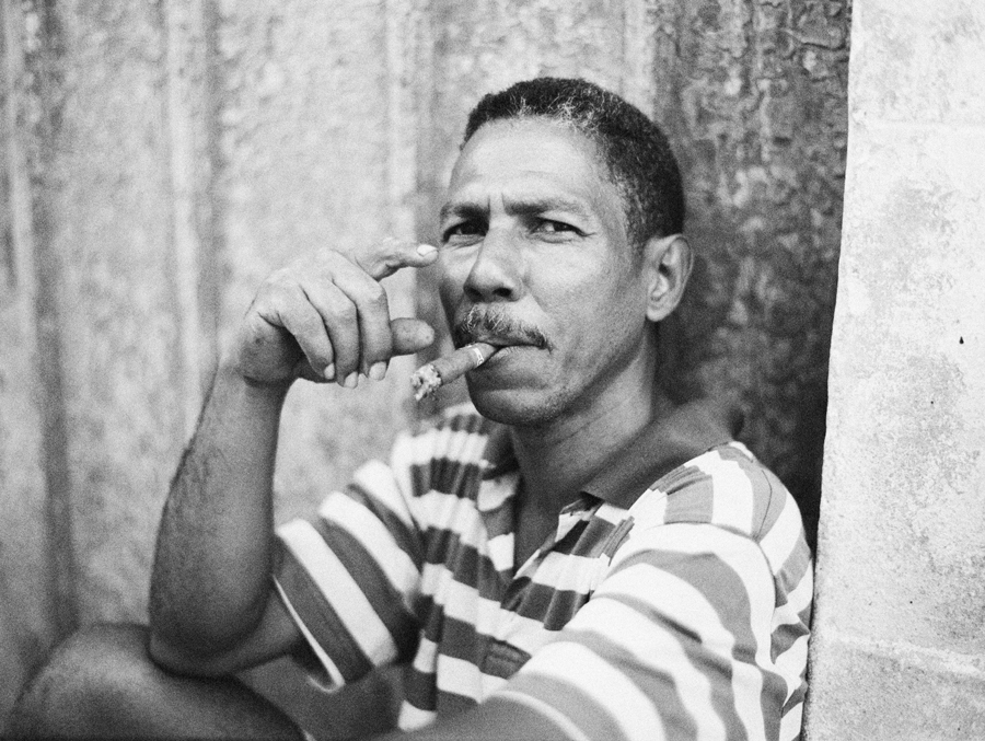 Man Smoking a Cigar in Cuba Man Smoking a Cigar in Cuba