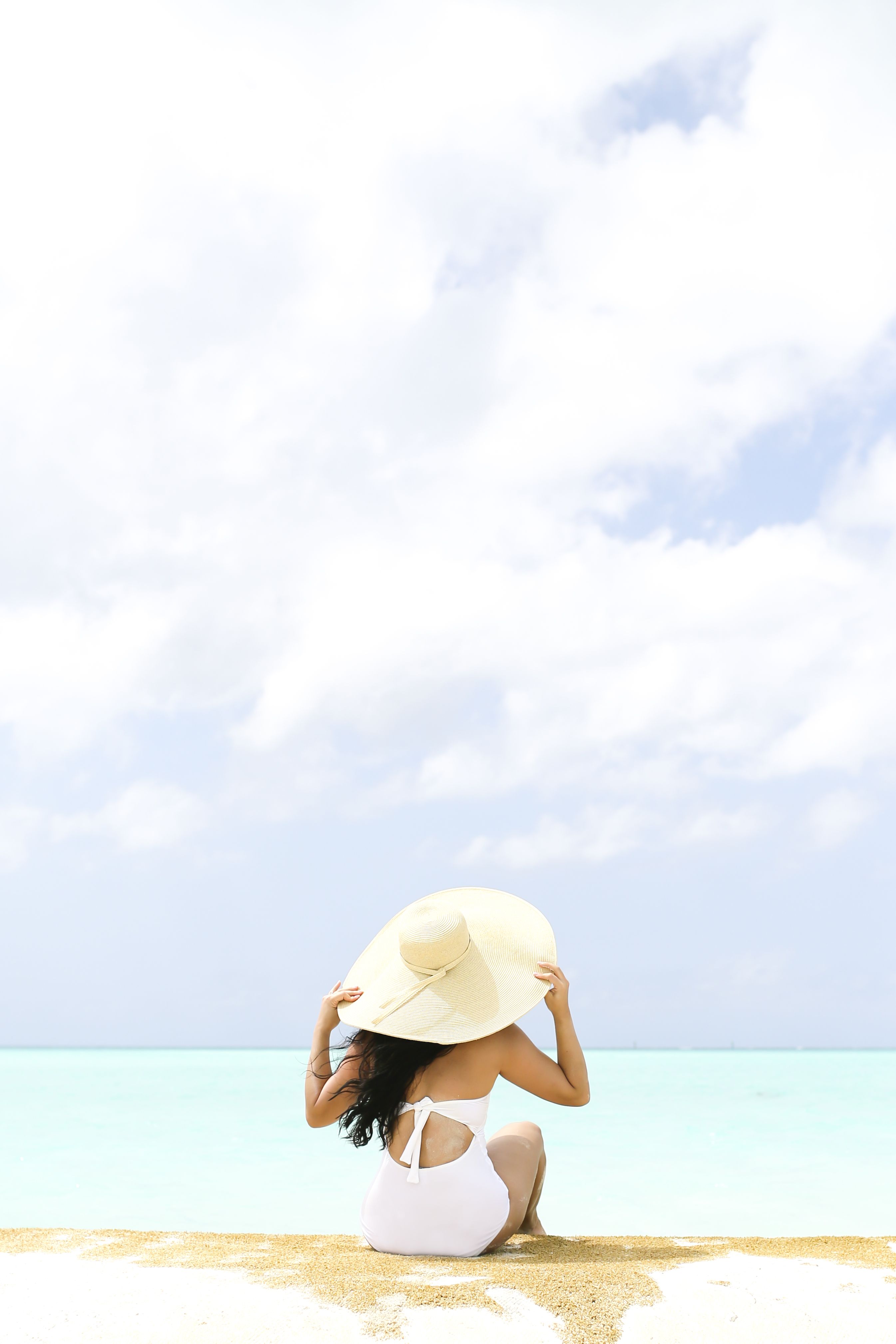 Woman and her Sun Hat in Turks and Caicos