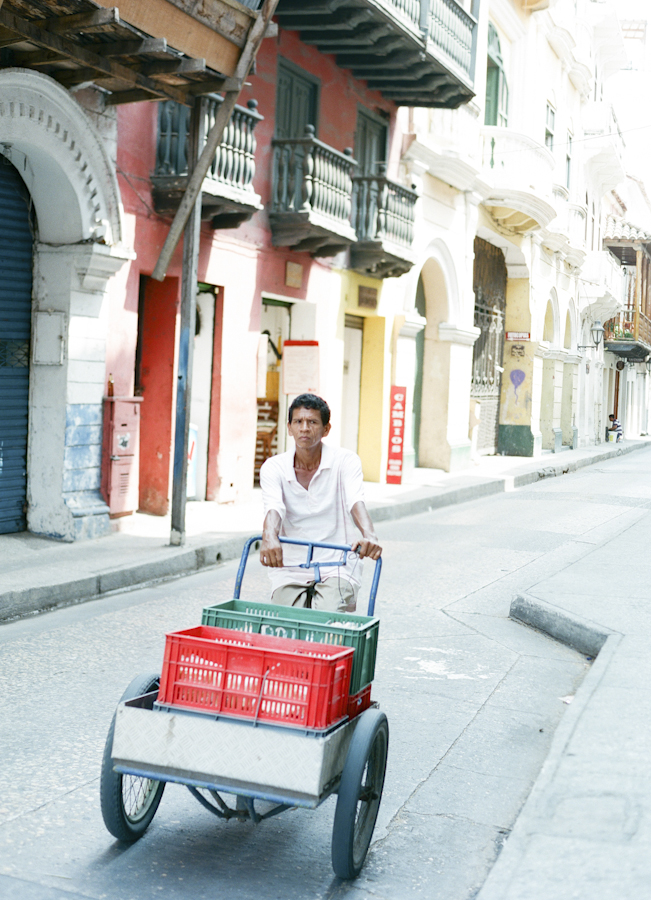 Man Pushing Cart in Cartagena Colombia