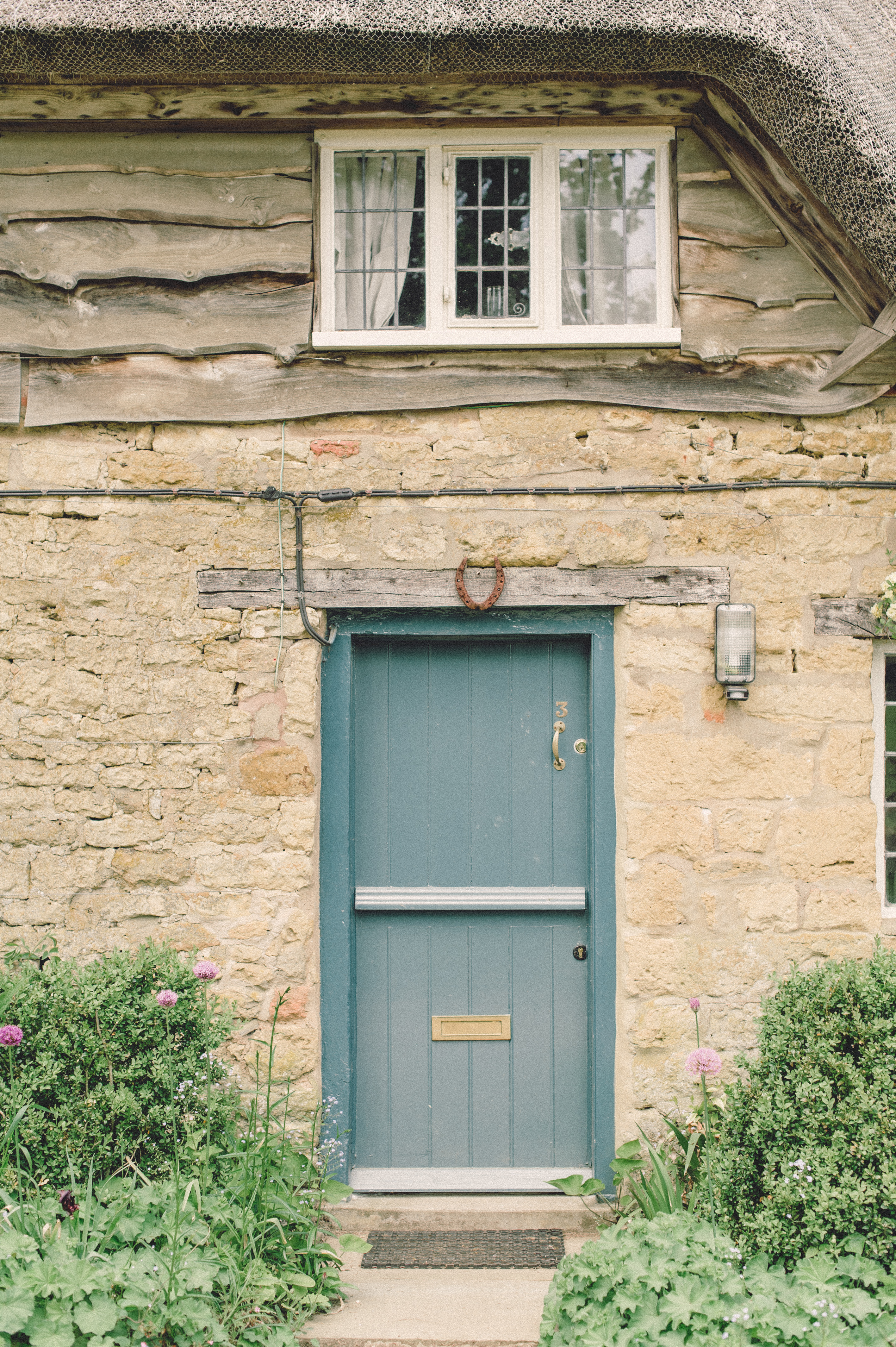 Blue Cottage Door in the Cotswolds